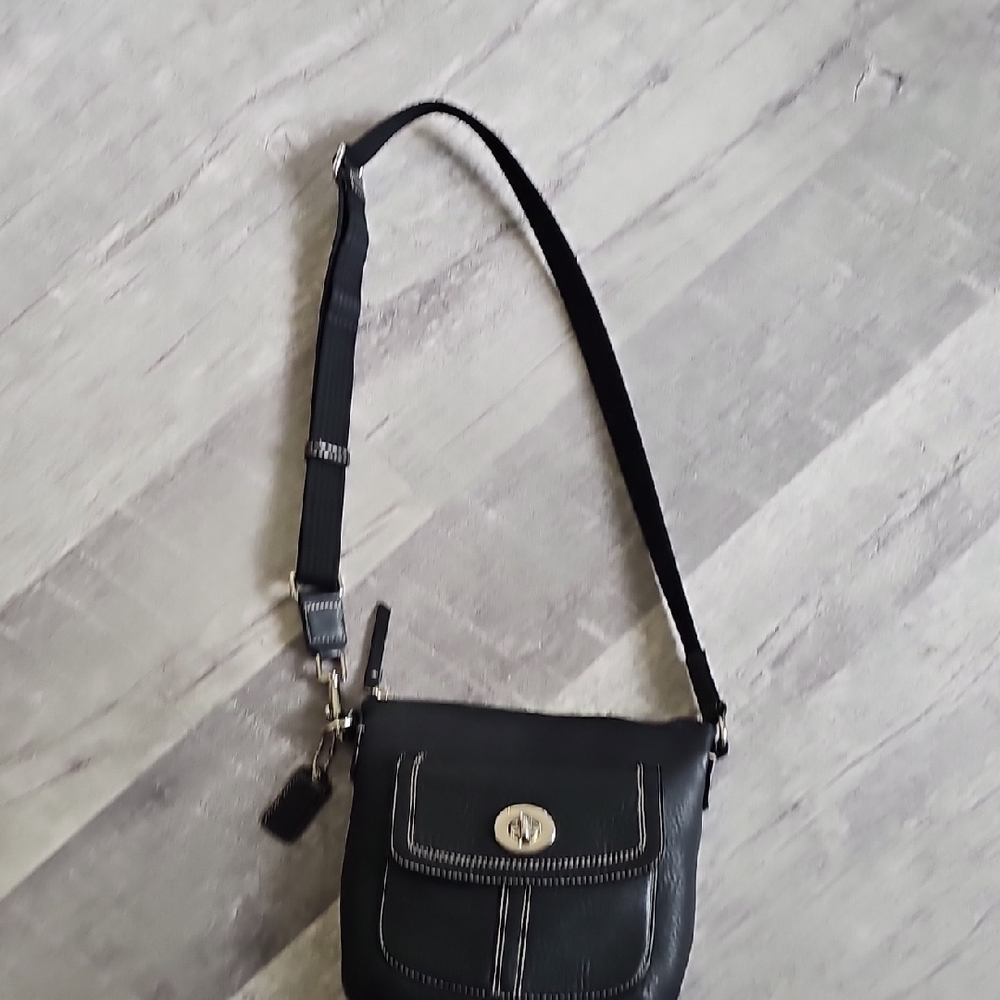 Coach Black Crossbody Bag with Adjustable Strap and Flap Closure Turnlock